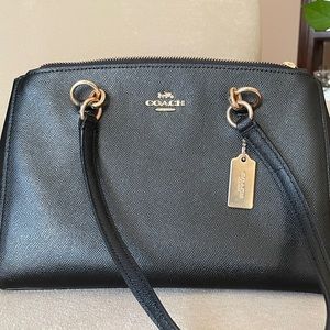 Black leather Coach handbag